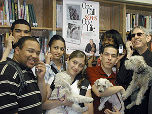 TV star Richard Belzer and Bebe, the dog he rescued as a stray, joined students at the Bronx School of Law and Finance on May 1 to launch Little Shelter's "One Call Saves One Life" campaign. Students are (from left to right): David Marrero, Jose Rodriguez, Valerie Tavarez, Alyssa Torres, David Lopez, and Megan Lord.