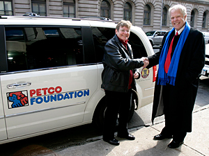 Mayor's Alliance President Jane Hoffman presents the new Wheels of Hope mini-van to PETCO Foundation Director Paul Jolly. The van was purchased thanks to a generous grant made by the PETCO Foundation.