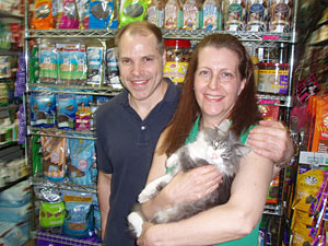 Pets NYC's Gene King and Maria Barney (with Lloyd) have combined efforts to perform TNR in the Hell's Kitchen neighborhood. (Photo by Mike Phillips)