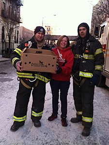 Mayor's Alliance for NYC's Animals staff, Debbie Fierro (shown) and Jenny Coffey, were assisted by FDNY firefighters in rescuing cats and other pets stranded in apartments near the East Harlem explosion site. (Photo by Jenny Coffey)